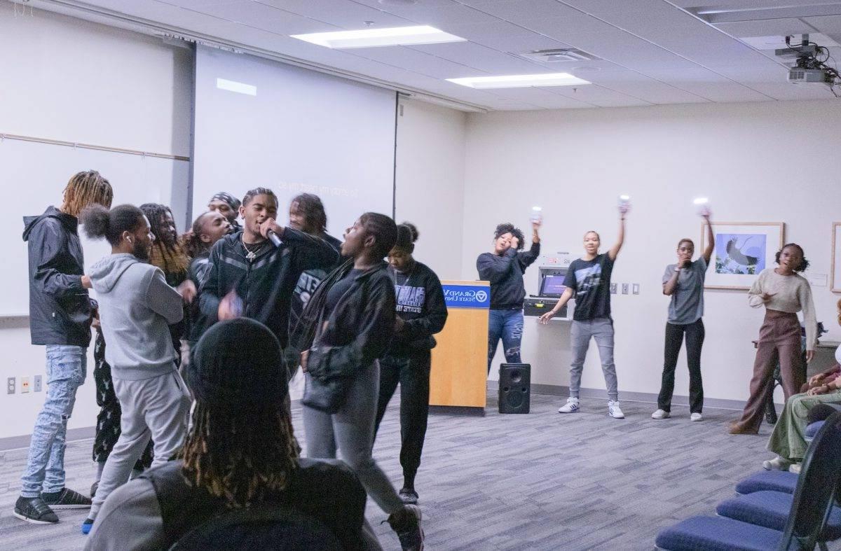 Members of Black Student Union singing and cheering